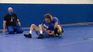 High school wrestler beats the odds and his opponents