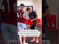 Odegaard signing a shirt for our summer target Declan Rice.