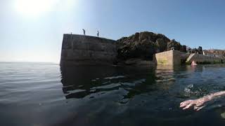 360 travel video. jumping/tombstoning in Portstewart harbour. Northern Ireland.