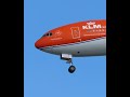 beautiful klm 777 300er orange pride livery landing at changi