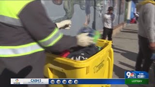 Sanitation crews, police move to toss Downtown migrant camp sites