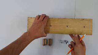 Pallet wood and shell casing coat hanger