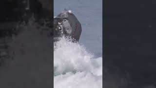 Boat almost got swallowed by waves.