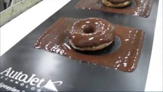 Spraying Chocolate on Doughnuts with AccuCoat® Heated Spray System spray com