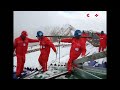 workers build super high voltage tower on top of tibetan mountain