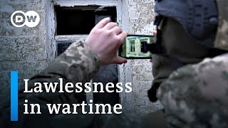Ukraine police: How to solve crimes in a war zone? | DW News