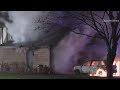 Firefighters battle garage fire at Barrington home