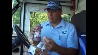 Mailman slams a box of Glazed Entenmanns Donut Pop'em Balls