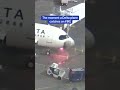 terrifying moment delta plane catches on fire forcing passengers to flee