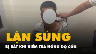 Lận súng đạn đi dạo, bị bắt khi đến chốt kiểm tra nồng độ cồn