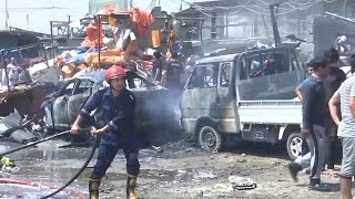 Baghdad: At least 12 dead as car bomb rips through shiite market