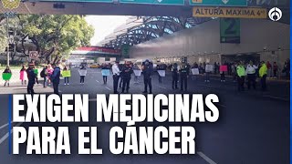 Familiares de personas con cáncer terminan bloqueo en AICM