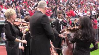 Members of the Cleveland Orchestra string section perform the national anthem