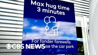 New Zealand airport puts three-minute cap on farewell hugs