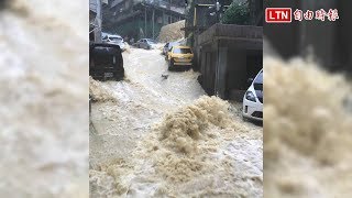 暴雨狂炸 基隆新西街驚見「泥黃瀑布」