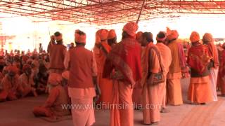 Naga sadhus waiting for prasad at Navaratri Bhandara in Varanasi