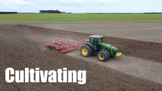 John Deere 8400R towing a Vaderstad Topdown 700 Cultivator