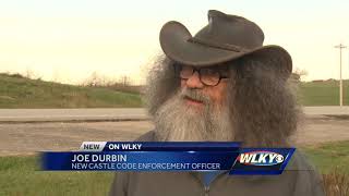 New Castle Code Enforcement Officer taking care of business