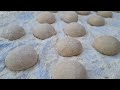 mother s baking the most delicate bread in the world and plastering the shelter