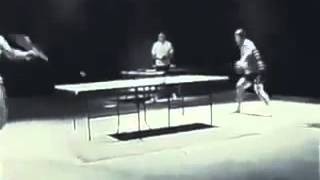 Bruce Lee playing ping pong with Nun Chucks