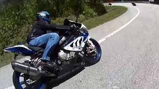 BMW S1000RR chases by Triumph Street Triple R