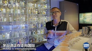 Taking shots of China’s finest firewater and watering kiwifruit with smartphones