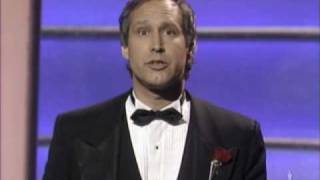 Chevy Chase hosting the 59th Academy Awards®