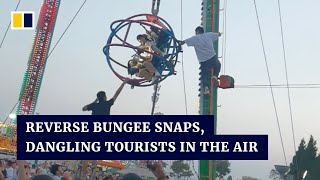Reverse bungee ride snaps, leaving tourists dangling in the air in China