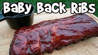 How to smoke baby back ribs on a Weber kettle grill and add a sticky sauce at the end.