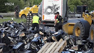 21.07.2020 - VN24 - hundreds of beer crates lost from an semi-trailer truck in a motorway junction