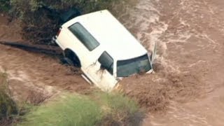 Dramatic flooding rescues caught on camera