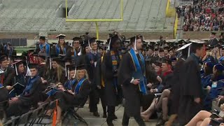 Dozens of students walk out during Vice President Pence commencement speech