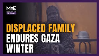 Displaced family faces harsh winter in flooded tent in Gaza.