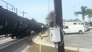 BNSF 3039 leads the 748 Job to the Alcoa Yard and El Segundo Yard after passing Sepulveda Blvd