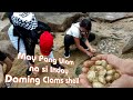 Picking up Clams during low tide