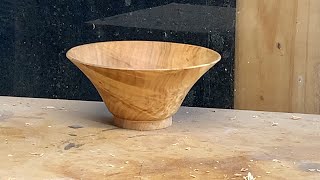 Richard Raffan turns a thin Tasmanian musk bowl.