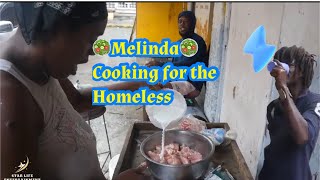 Melinda cooking baked curry chicken and rice and peas with tang juice for she and the homeless 🥙🌮🥗