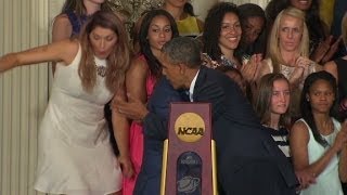 Obama helps UConn player who fell off stage