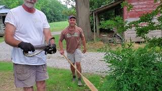 Tim catches another snake.