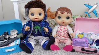 Baby Alive Abby and Drake packing for vacation doll travel routine