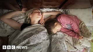 Family secretly film life in Russian-occupied Ukraine - BBC News