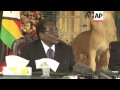 Mugabe swears in cabinet of veteran hardliners