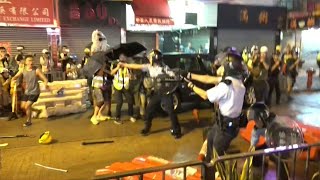 Hong Kong police say forced to fire warning shot | AFP