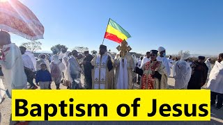 Ethiopian Orthodox celebrate Epiphany, Timkat (ጥምቀት), at the Jordan River, marking Jesus' baptism.