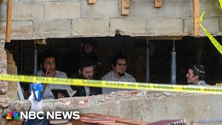 Secret tunnel discovered beneath New York synagogue with 12 worshippers inside