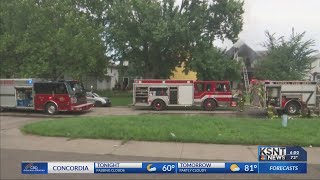 Fire crews work to rescue baby from downtown Topeka house fire