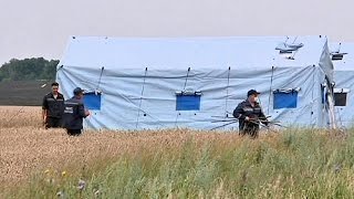 Flight MH17 crash victims' remains still delayed in eastern Ukraine