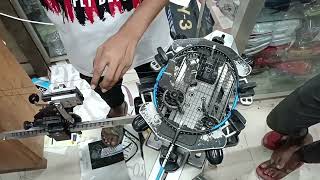 professional badminton racket stringing. মেশিনে কিভাবে ব্যাডমিন্টন স্টিং রগ টাইট  দেওয়া হয় দেখুন।