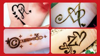 A Letter Tattoo With Heart Mehndi Design Special Someone