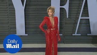 Lady in red! Rita Ora stuns at the Vanity Fair Oscar party - Daily Mail